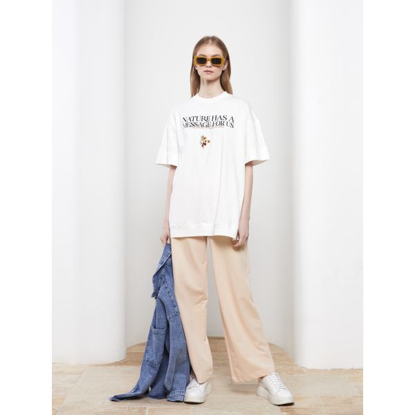 بلوزة نسائية طويلة من القطن المطبوع بكم قصير وفتحة رقبة مستديرة